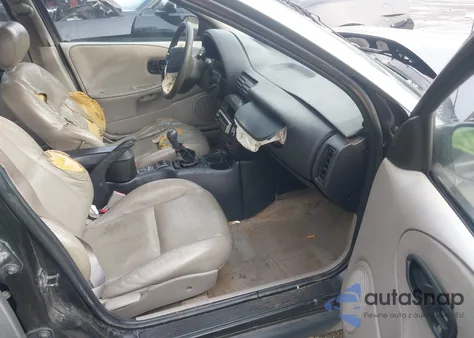 1997 Saturn Sl Sl2 z USA, uszkodzony, nr VIN 1G8ZJ5271VZ219882